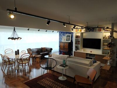 Pinheiros — sala com chandelier e taco